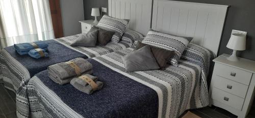 Postel nebo postele na pokoji v ubytování El Rato Apartamentos Rurales