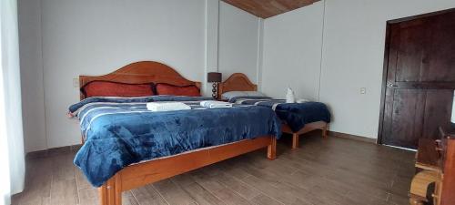 A bed or beds in a room at Centro Ecoturistico Rio Chuc Tej