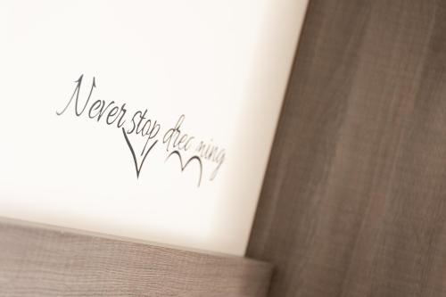 a book with the words never show up anymore at Hotel Edelweiss Riccione in Riccione
