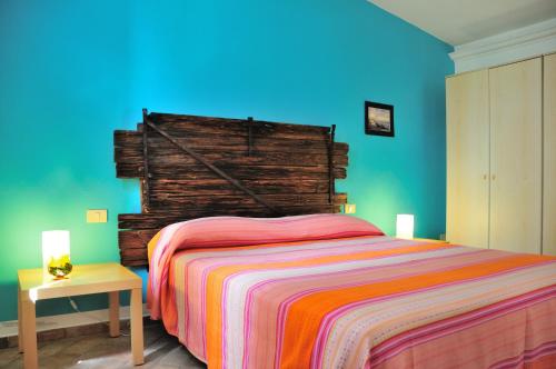 Posteľ alebo postele v izbe v ubytovaní Azienda Agrituristica Il Giuggiolo