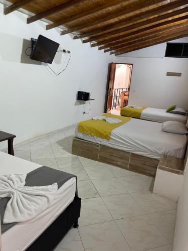 Katil atau katil-katil dalam bilik di Hotel Brisas MEDELLIN