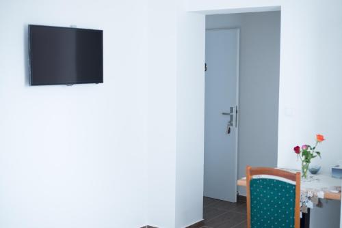 Una televisión o centro de entretenimiento en Cáfe 168