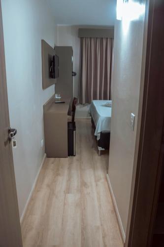 Postel nebo postele na pokoji v ubytování Palotina Palace Hotel