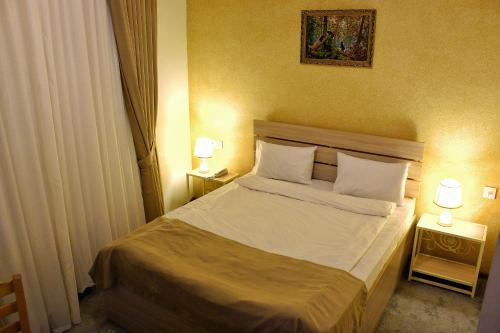 Antique Palace Baku Hotelにあるベッド