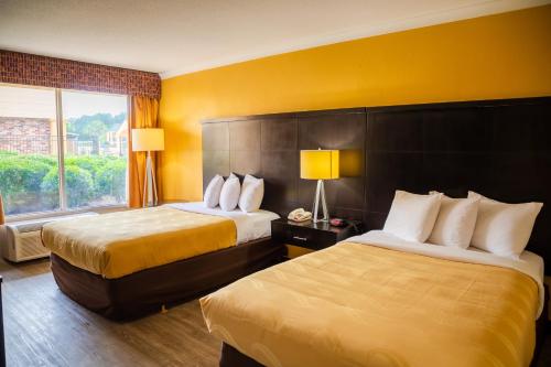 Postel nebo postele na pokoji v ubytování Quality Inn Richmond Hill - Savannah I-95