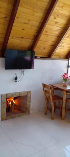 TV a/nebo společenská místnost v ubytování Chale brilho do sol