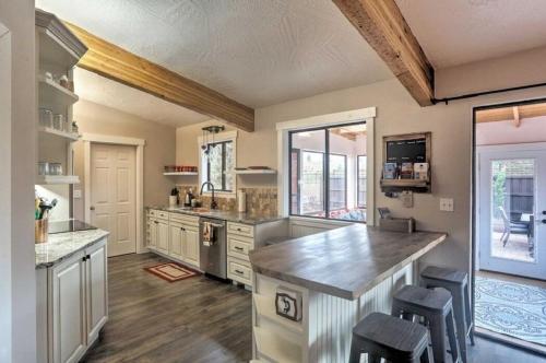 a large kitchen with a large island in the middle at Beautiful Sedona Home Near Chapel of the Holy Cross in Sedona