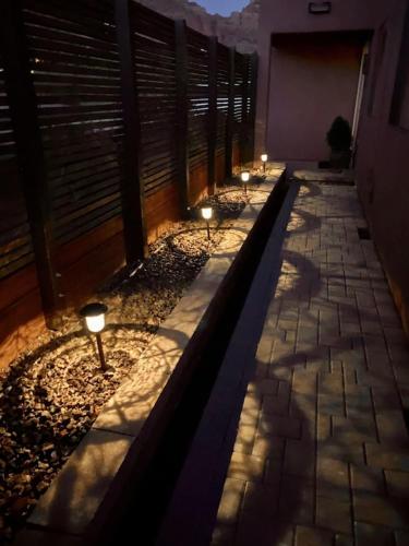 a row of lights on a patio with a building at Beautiful Sedona Home Near Chapel of the Holy Cross in Sedona