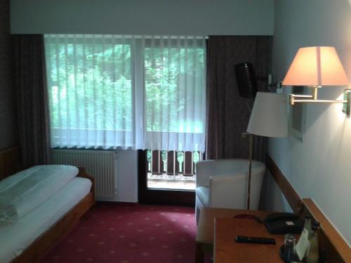 Cama o camas de una habitación en Hotel Büchner Garni