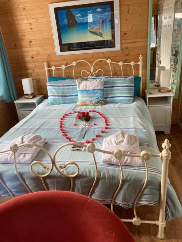 Postel nebo postele na pokoji v ubytování SherPai Lodge
