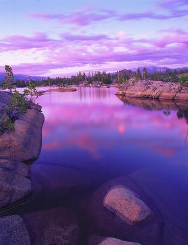 a large body of water with rocks in it at Sunny End Unit Condo! - Tamarack #20 in Bear Valley
