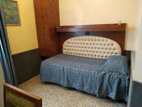 a bedroom with a bed in a room at Atlantide Hotel in Venice