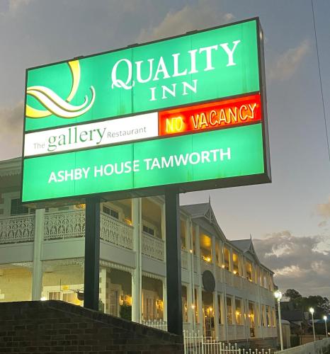 a large sign in front of a building at Quality Inn Ashby House Tamworth in Tamworth