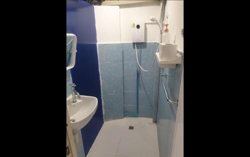 Un baño de P & T Hostel