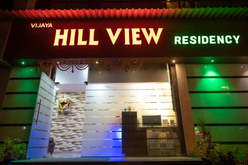 a hilvy sign on the front of a building at VIJAYA HILL VIEW RESIDENCY in Navi Mumbai