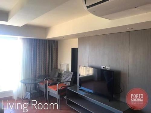 a living room with a living room at Amazing sea view Penthouse Apartment in Pyramids Porto El-Sokhna in Ain Sokhna