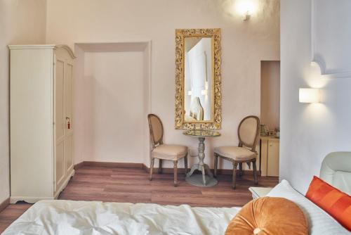 Кровать или кровати в номере Palazzo del Magnifico B&B