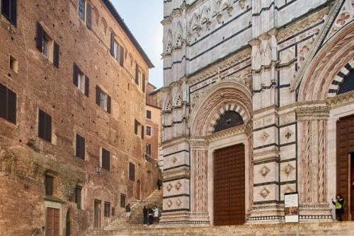 Фотография из галереи Palazzo del Magnifico B&B в Сиене