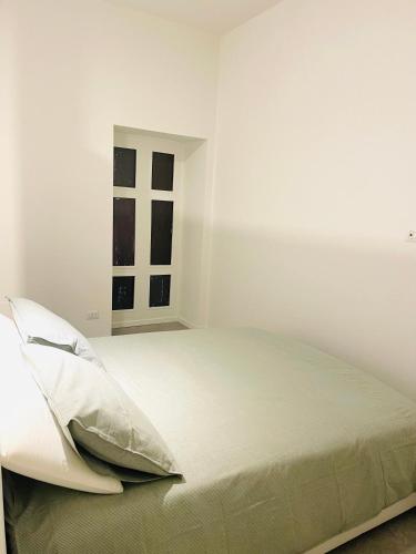 Postel nebo postele na pokoji v ubytování La Pilo