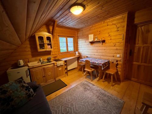 an overhead view of a kitchen in a log cabin at Apartament Lis in Szczyrk
