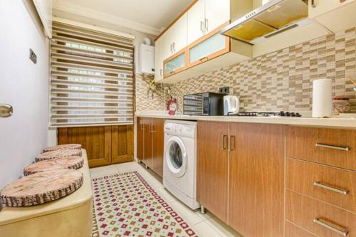 A kitchen or kitchenette at 34 Yüksel Caddesi
