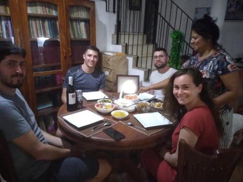 a group of people sitting around a table at Villu Villa in Anuradhapura