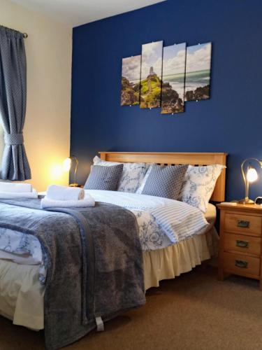 Ένα ή περισσότερα κρεβάτια σε δωμάτιο στο Oakfield Guest House