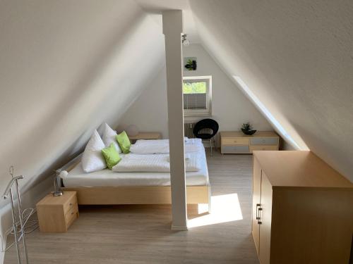 Säng eller sängar i ett rum på Steinmännchen Ferienwohnung