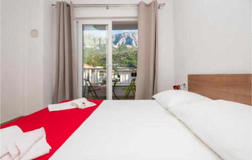 Postel nebo postele na pokoji v ubytování Beautiful Apartment In Drvenik With Kitchen