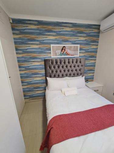 Łóżko lub łóżka w pokoju w obiekcie 36 frere road shelly beach , margate