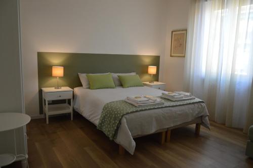 Voodi või voodid majutusasutuse Via Da Velo 8 appartamento toas