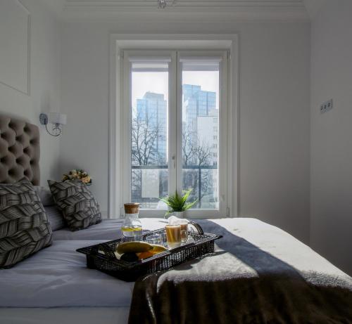 Posteľ alebo postele v izbe v ubytovaní Warsaw Seasons by Alluxe Boutique Apartments