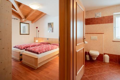 Ванная комната в Appartamenti Agriturismo Cèsa Ciasates