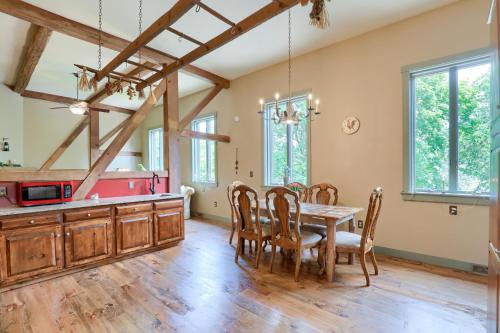 a kitchen and dining room with a table and chairs at Ye Olde Stone Gables in Ephrata