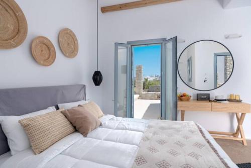 Un pat sau paturi într-o cameră la IL Vento Premium