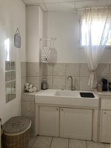 Vonios kambarys apgyvendinimo įstaigoje Gîte Comme à la maison