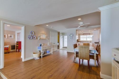 a living room with a table and a dining room at Work Friendly Oceanfront SURF25 Condo in Solana Beach