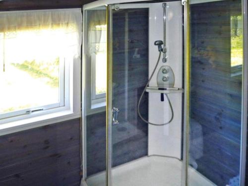 Ванная комната в Holiday home TYSSE