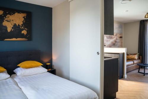 מיטה או מיטות בחדר ב-Strand, Zee & Meer