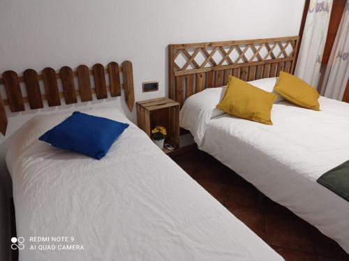 Cama o camas de una habitación en La Posada Vivienda Turística Rural