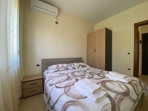 Cama o camas de una habitación en OniRana Apartments