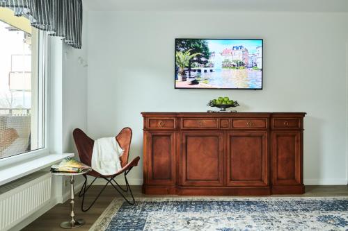 TV o dispositivi per l'intrattenimento presso Aparthotel Voglergasse