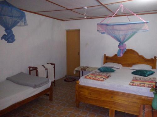 Katil atau katil-katil dalam bilik di Ella j villa