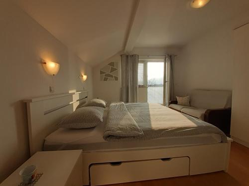 Katil atau katil-katil dalam bilik di Kuća za odmor DIVA***