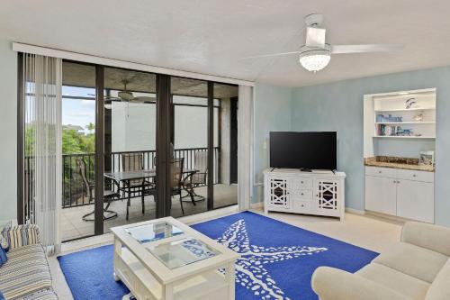 Updated Two Bedroom Beach Residence at Compass Point- Great Amenities with Bikes