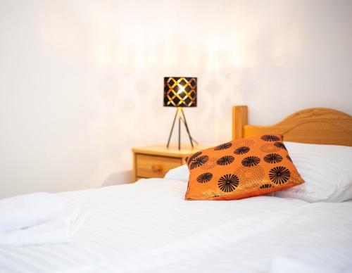 Postel nebo postele na pokoji v ubytování Penzión PALATÍN