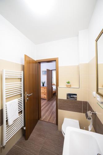 Postel nebo postele na pokoji v ubytování Penzión PALATÍN