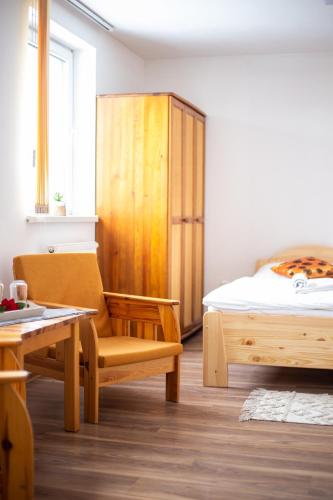 Postel nebo postele na pokoji v ubytování Penzión PALATÍN