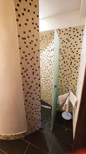a small bathroom with a toilet in a stall at Motorest U Kola in Prostějov