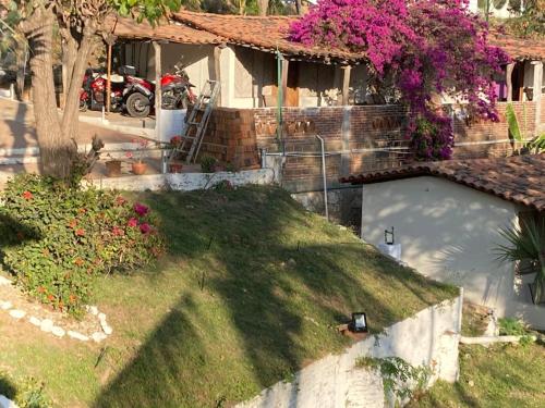 Κήπος έξω από το Casa de la Gente Nube